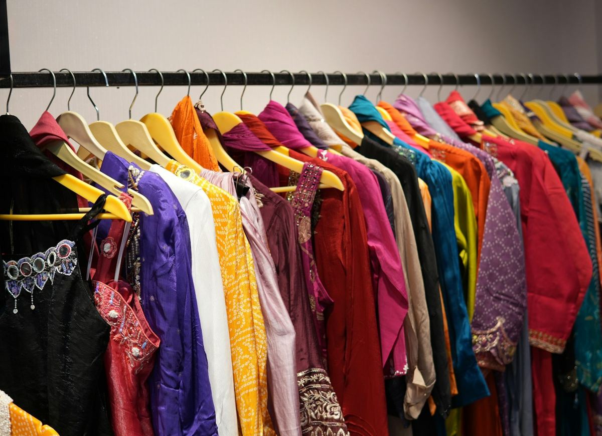 Colourful garments on a rack in an Indian clothing store
